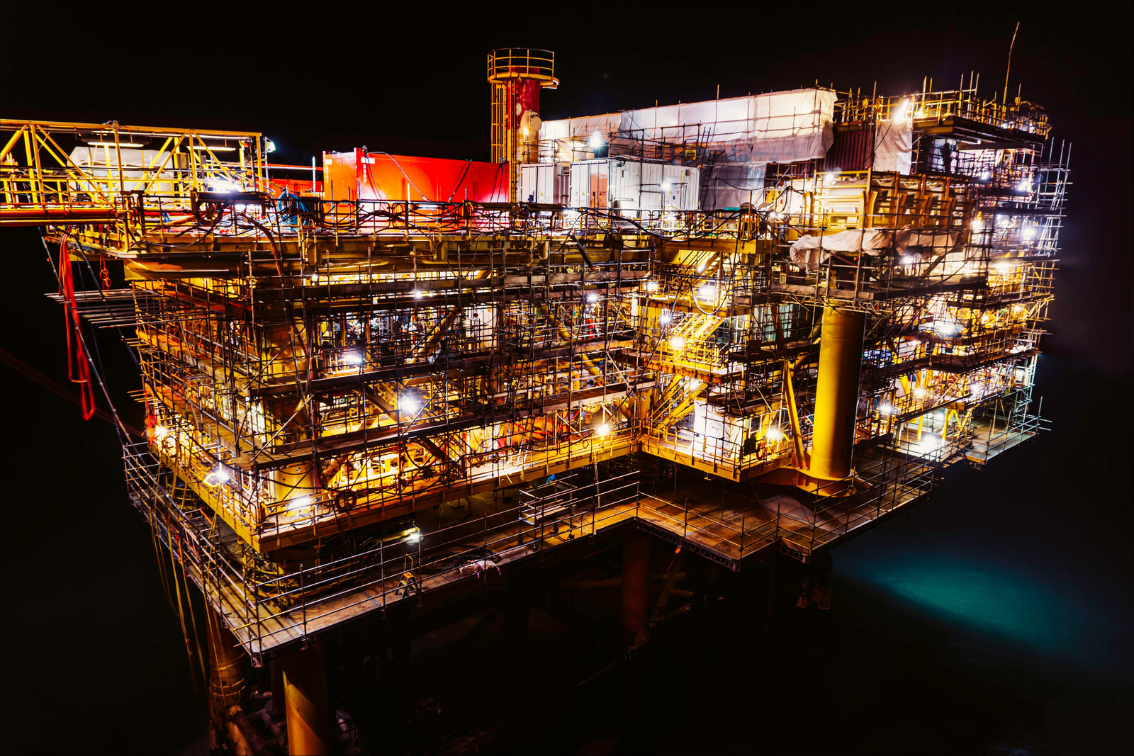 Offshore oil and gas platform at night — Marine & Offshore industrial coatings — coating systems